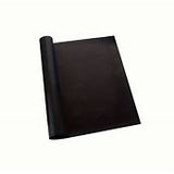 A rolled up black oven liner.