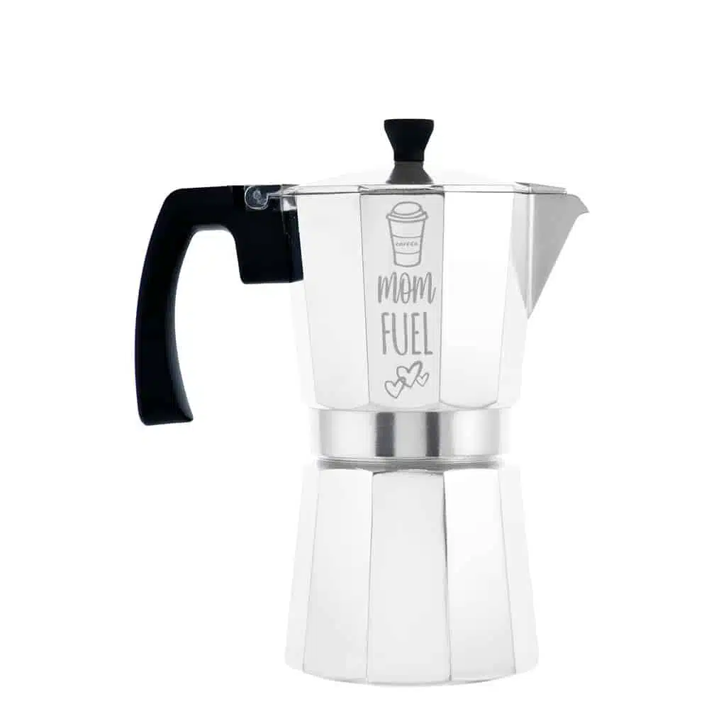 A silver MILANO Moka Pot, a stovetop espresso maker with a black handle and a glass body, labeled 'Moka Fuel'.