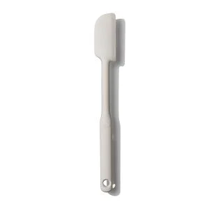 A gray silicone spatula with a stainless steel handle, isolated on a white background.