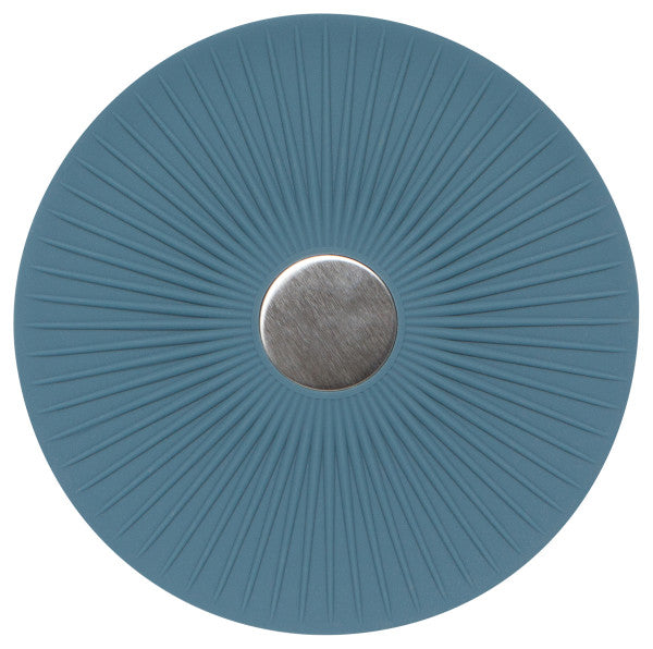 A blue round trivet with a metallic center, designed to be used as a mat for hot dishes.