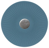 A blue round trivet with a metallic center, designed to be used as a mat for hot dishes.
