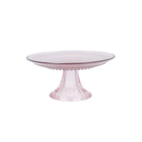 A pink mini cake stand with a textured edge and a central support, designed for serving bite-size desserts.