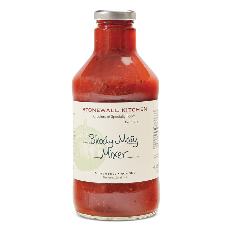 A bottle of Stonewall Kitchen Bloody Mary Mixer, 24oz size, with visible pieces of spices and a red liquid.