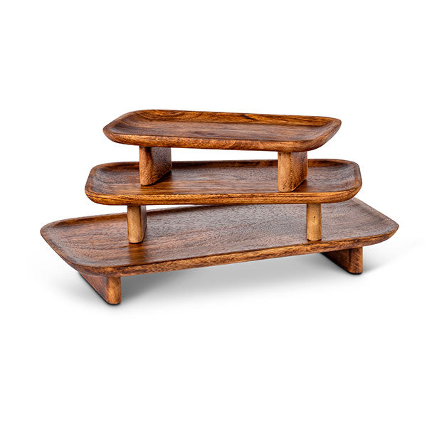 A mango wood server with multiple levels, featuring a natural wood finish.