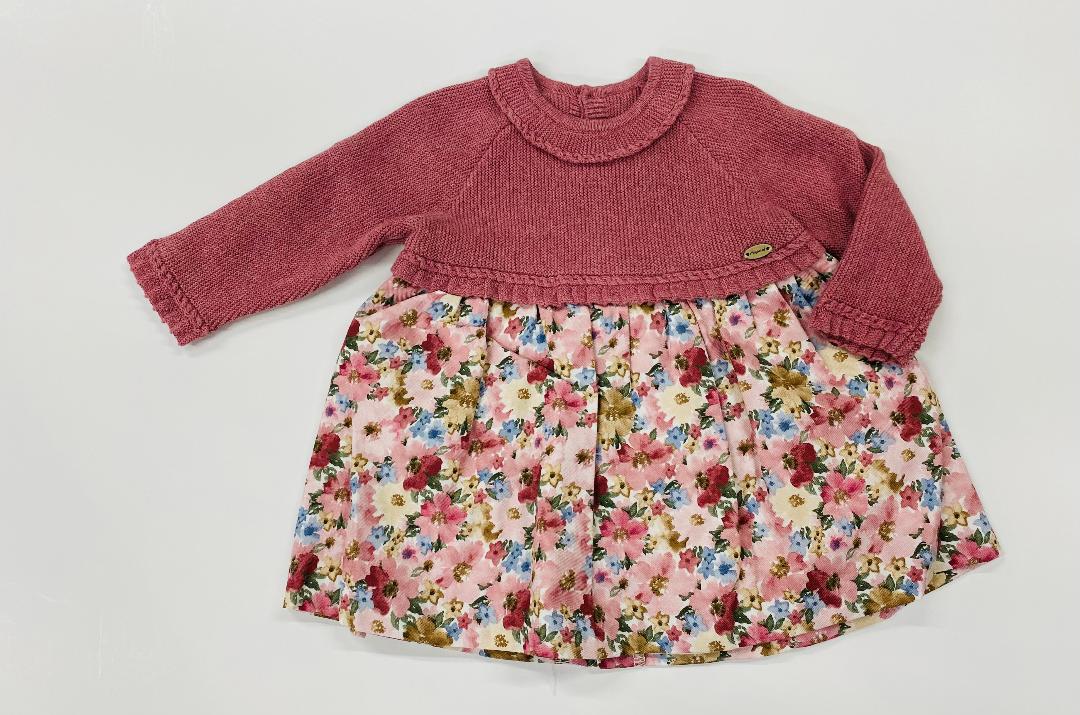 AMayoral Combined Knit Dress consisting of a red knit top and a multicolored floral print skirt.