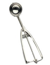 A stainless steel ice cream scoop with a spring release mechanism.