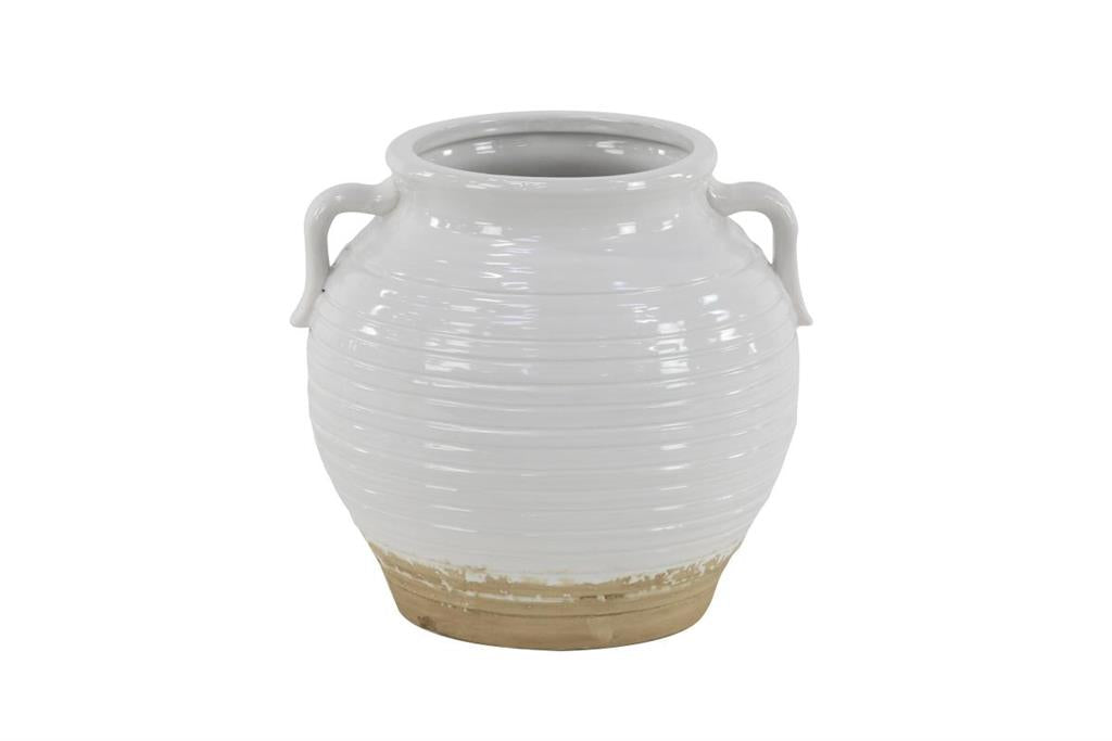 A white ceramic planter with two handles on the side.