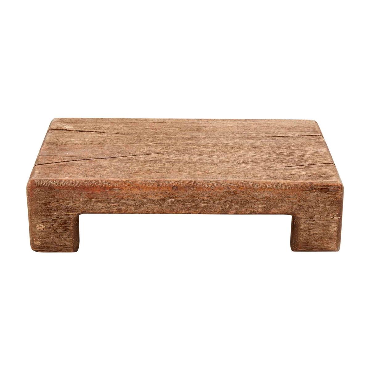 A rectangular wooden riser board with a smooth finish and no visible branding.