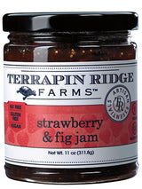 A jar of Terrapin Ridge Farms Strawberry & Fig Jam with the label facing forward. The label indicates that the jam is gluten-free, oil-free, vegan, and dairy-free.