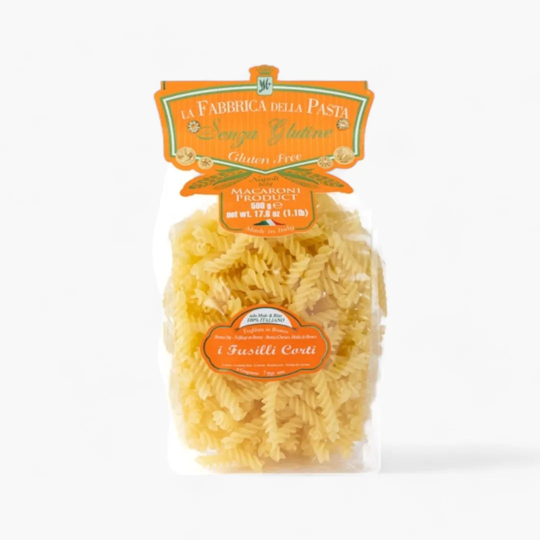 Packaged gluten-free pasta with a clear label on a white background