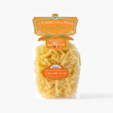 Packaged gluten-free pasta with a clear label on a white background