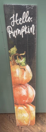 A decorative item with the text 'Hello Pumpkin' at the top, featuring images of pumpkins below the text.